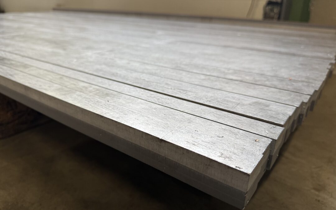 A vacuum explosion welded clad plate
