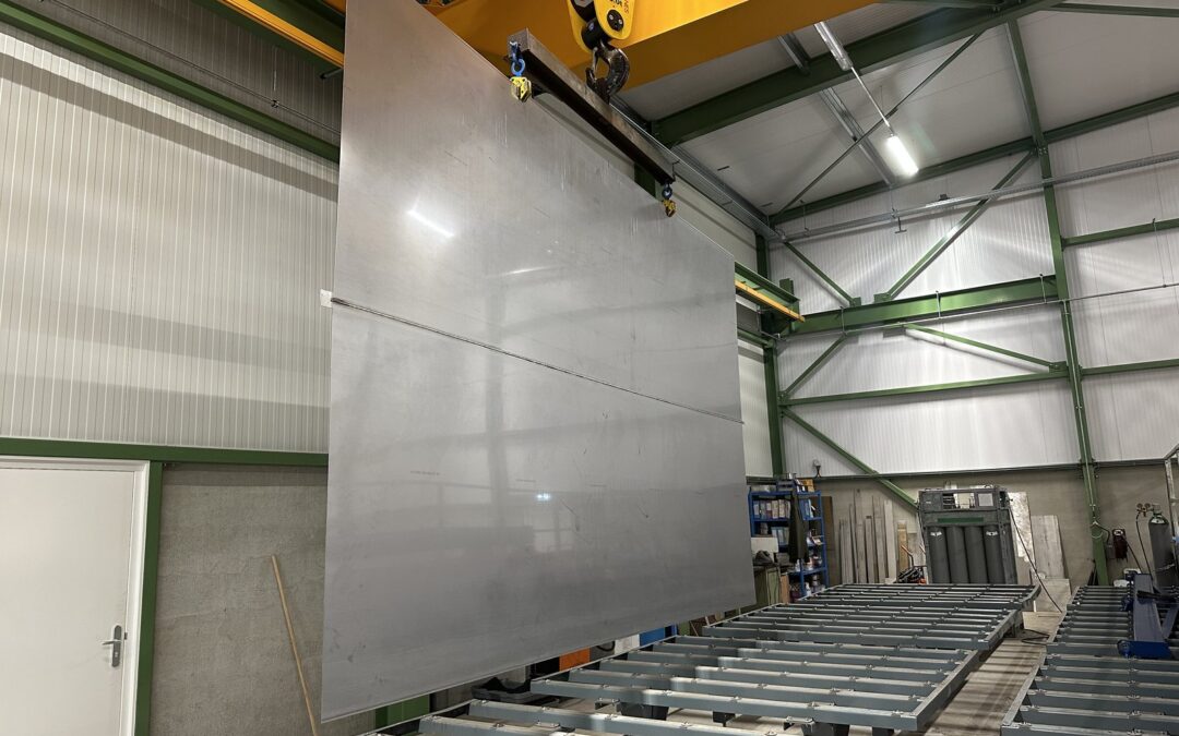 Large explosion clad plate standing upright in the Shockwave production hall